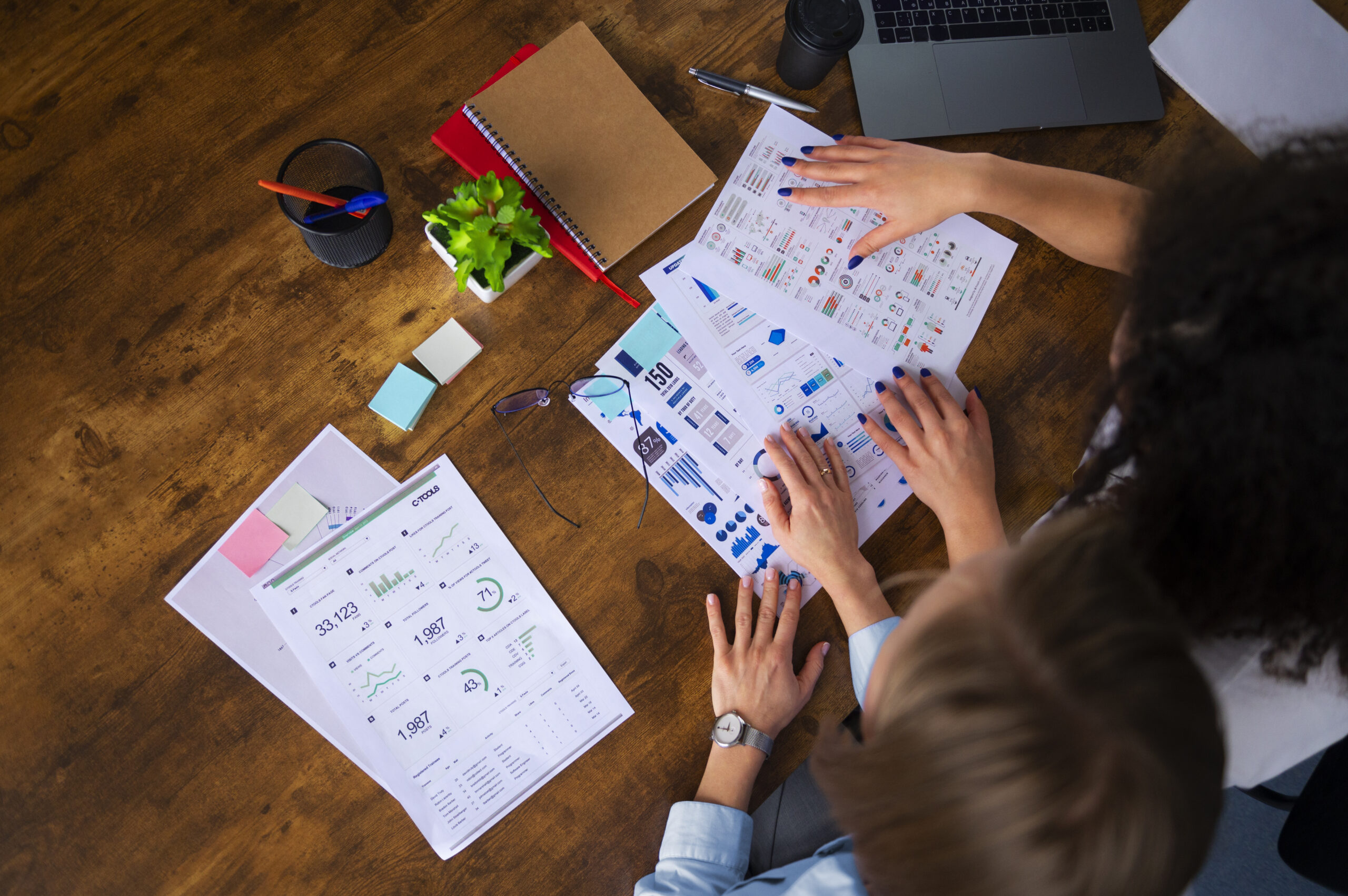 top-view-women-working-together-office